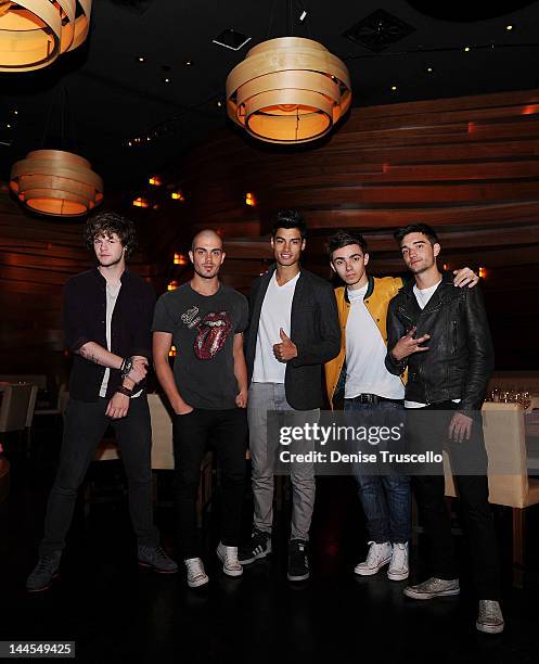 Jay McGuiness, Max George, Siva Kaneswaran, Nathan Sykes and Tom Parker of the musical group The Wanted portraits at Stack restaurant at the Mirage...