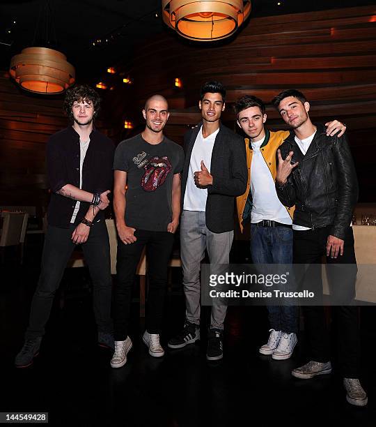 Jay McGuiness, Max George, Siva Kaneswaran, Nathan Sykes and Tom Parker of the musical group The Wanted portraits at Stack restaurant at the Mirage...