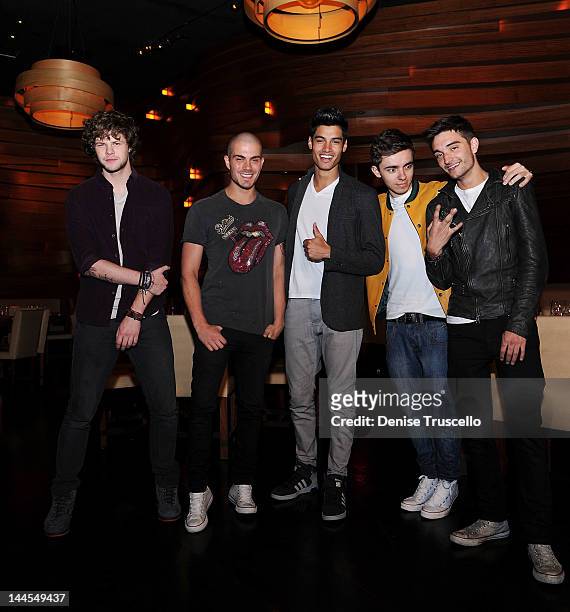 Jay McGuiness, Max George, Siva Kaneswaran, Nathan Sykes and Tom Parker of the musical group The Wanted portraits at Stack restaurant at the Mirage...