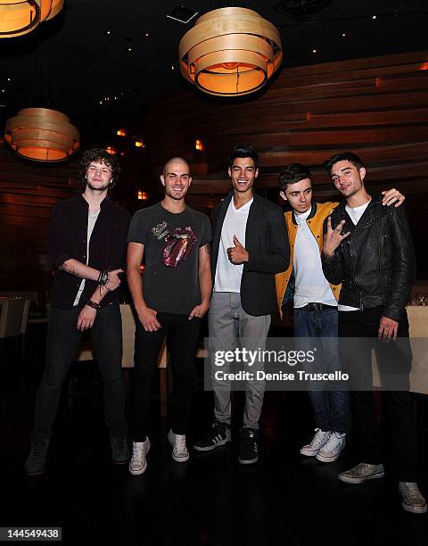 Jay McGuiness, Max George, Siva Kaneswaran, Nathan Sykes and Tom Parker of the musical group The Wanted portraits at Stack restaurant at the Mirage...