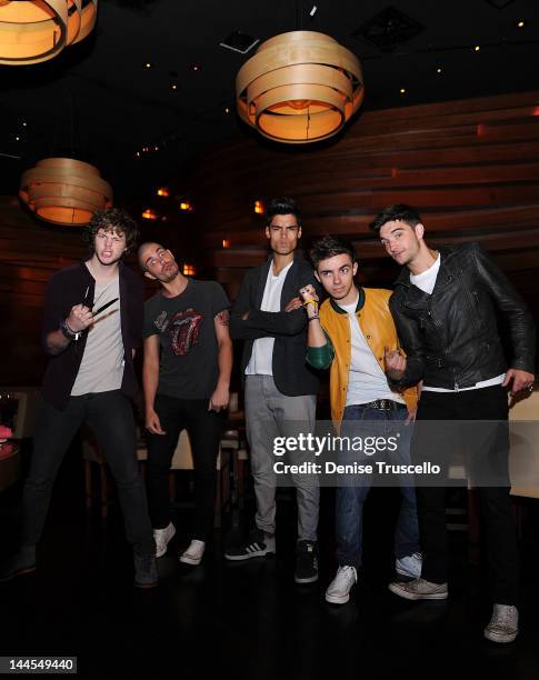 Jay McGuiness, Max George, Siva Kaneswaran, Nathan Sykes and Tom Parker of the musical group The Wanted portraits at Stack restaurant at the Mirage...