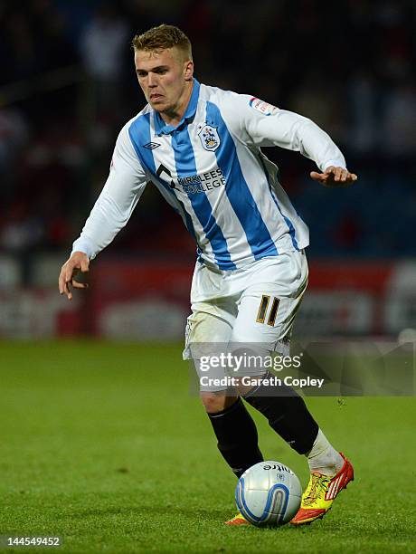 Danny Ward of Huddersfield in action during the npower League One Semi Final 2nd Leg match between Huddersfield Town and MK Dons at Galpharm Stadium...