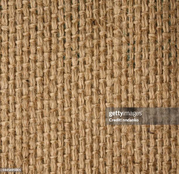 Texture of brown burlap, rough fabric with fibers for bags, macro texture brown burlap rough fabric with
