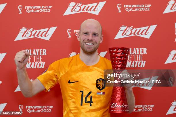 Davy Klaassen of Netherlands poses with the Budweiser Player of the Match trophy during the FIFA World Cup Qatar 2022 Group A match between...