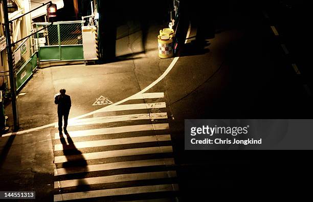 pedestrian in shibuya backstreet - tokyo japan night alley stock pictures, royalty-free photos & images