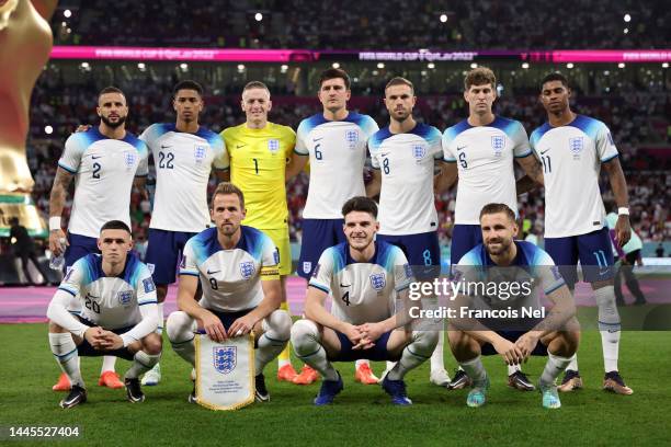England players line up for the team photos prior to the FIFA World Cup Qatar 2022 Group B match between Wales and England at Ahmad Bin Ali Stadium...