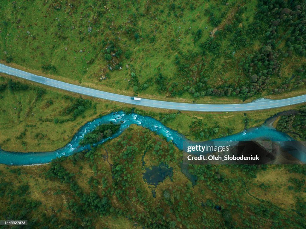Aerial view of road in river valley in Norway