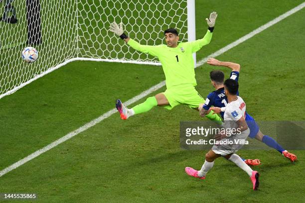 Christian Pulisic of United States scores their first goal during the FIFA World Cup Qatar 2022 Group B match between IR Iran and USA at Al Thumama...