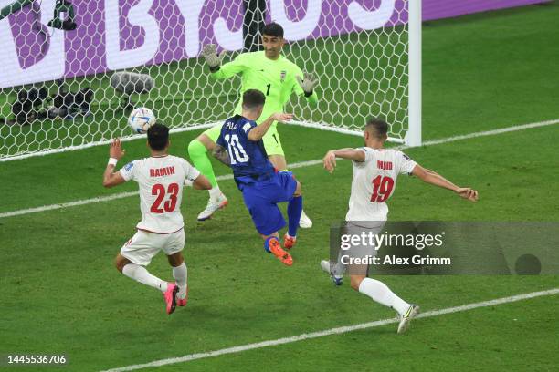 Christian Pulisic of United States scores their team's first goal during the FIFA World Cup Qatar 2022 Group B match between IR Iran and USA at Al...