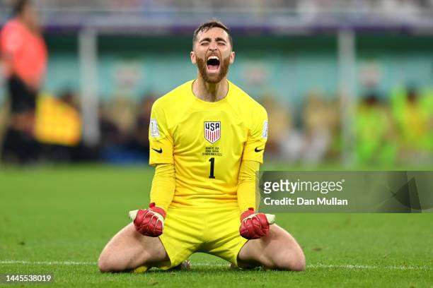 Matt Turner of United States celebrates after their first goal by Christian Pulisic during the FIFA World Cup Qatar 2022 Group B match between IR...
