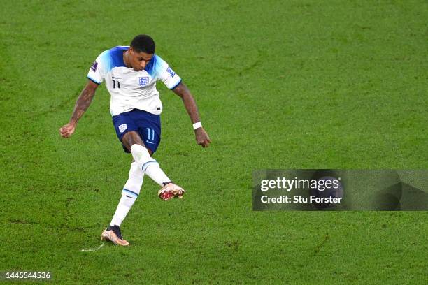 Marcus Rashford of England scores their team's first goal during the FIFA World Cup Qatar 2022 Group B match between Wales and England at Ahmad Bin...