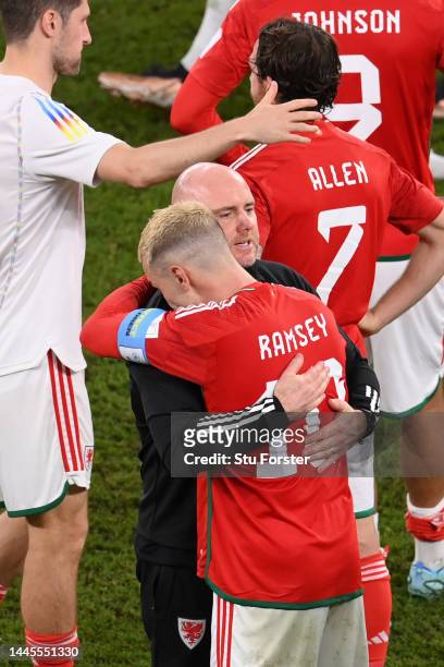 Rob Page, Head Coach of Wales, embraces Aaron Ramsey after the 3-0 win during the FIFA World Cup Qatar 2022 Group B match between Wales and England...