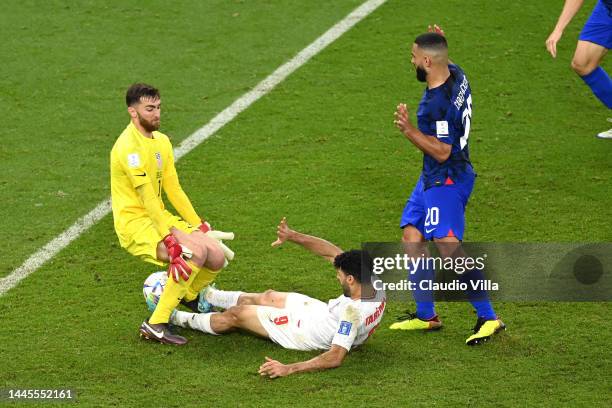 Cameron Carter-Vickers of United States battles for possession with Mehdi Taremi of IR Iran during the FIFA World Cup Qatar 2022 Group B match...