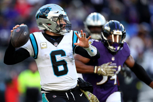 Quarterback Baker Mayfield of the Carolina Panthers throws a pass against the Baltimore Ravens at M&T Bank Stadium on November 20, 2022 in Baltimore,...
