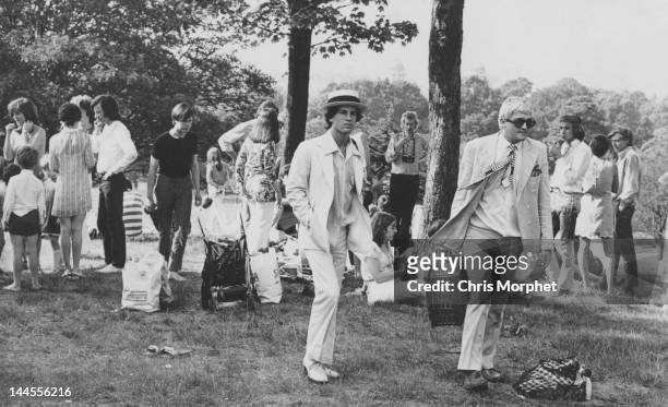 Artist David Hockney with his partner Peter Schlesinger at a picnic in Greenwich Park, London, 7th June 1969.