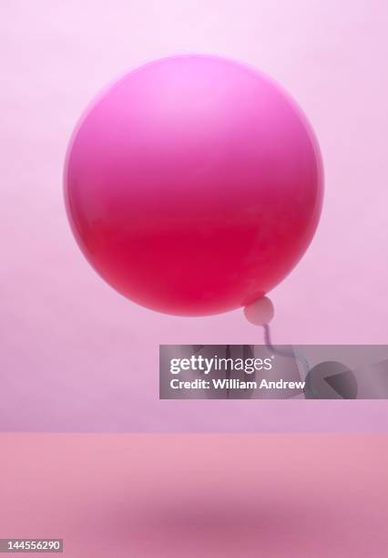 lone sperm swimming toward egg - human egg stock pictures, royalty-free photos & images