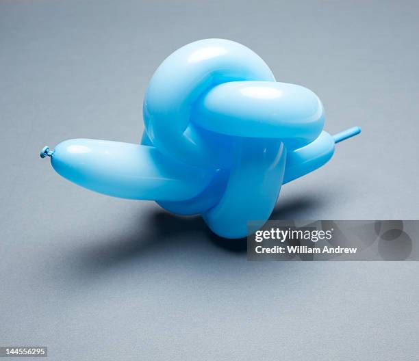 balloon tied in knot - gebunden stock-fotos und bilder