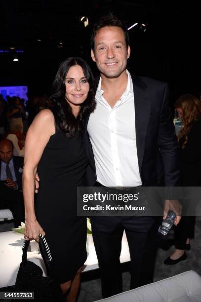 Courteney Cox and Josh Hopkins attend the TNT/ TBS Upfront 2012 at Hammerstein Ballroom on May 16, 2012 in New York City. 22362_001_0017.JPG