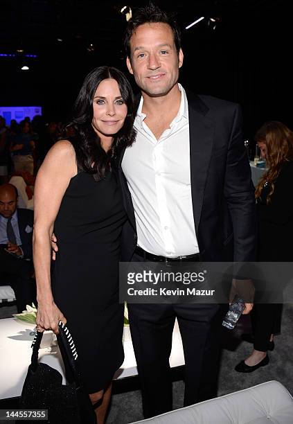 Courteney Cox and Josh Hopkins attend the TNT/ TBS Upfront 2012 at Hammerstein Ballroom on May 16, 2012 in New York City. 22362_001_0019.JPG