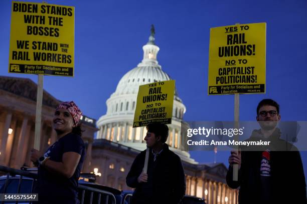 Activists in support of unionized rail workers protest outside the U.S. Capitol Building on November 29, 2022 in Washington, DC. President Joe Biden...