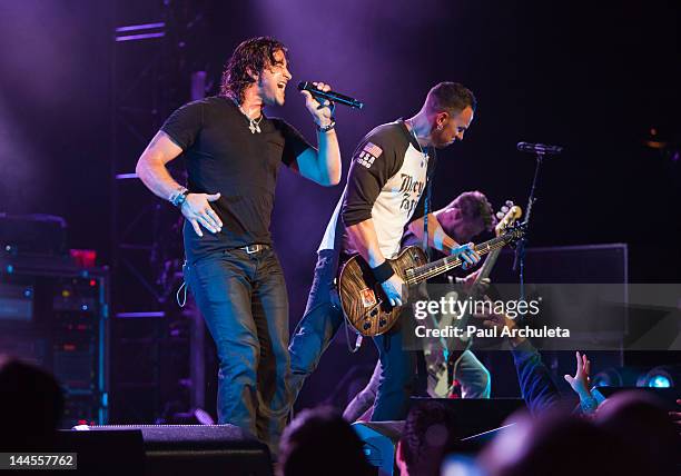 Scott Stapp and Mark Tremonti of the Rock Band Creed performs in concert with Eve To Adam at The Wiltern on May 15, 2012 in Los Angeles, California.