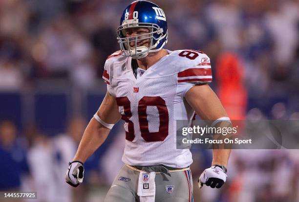 Jeremy Shockey of the New York Giants reacts after catching a pass and getting a first down against the New Orleans Saints during an NFL football...