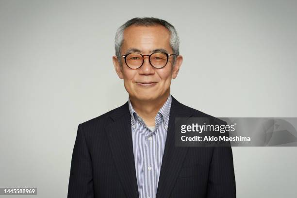 wise japanese man with years of experience - 60 69 years bildbanksfoton och bilder