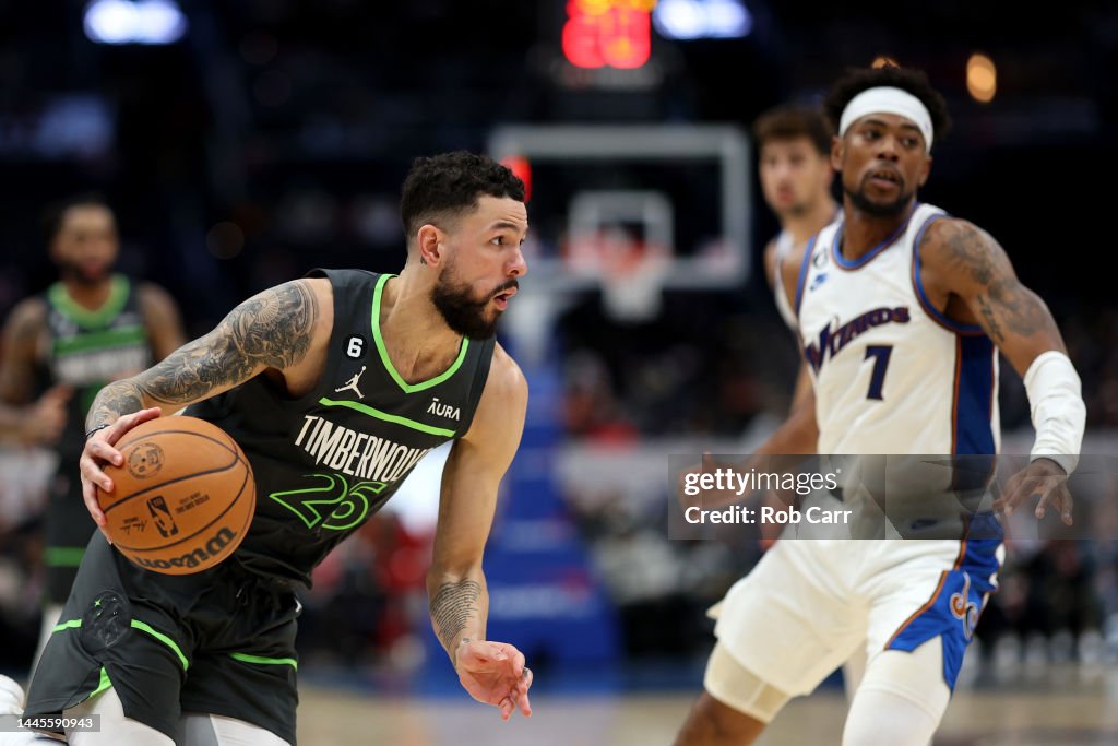 Austin Rivers Wolves Austin Rivers of the Minnesota Timberwolves drives around Jordan ...