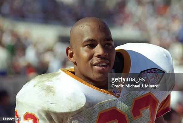 Full Back Anthony McDowell of the Tampa Bay Buccaneers looks at the replay of his action in the Jumbotron during a NFL game against the Los Angeles...