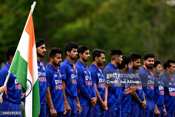 India stand for the national anthems during game three of the One Day International series between New Zealand and India at Hagley Oval on November...