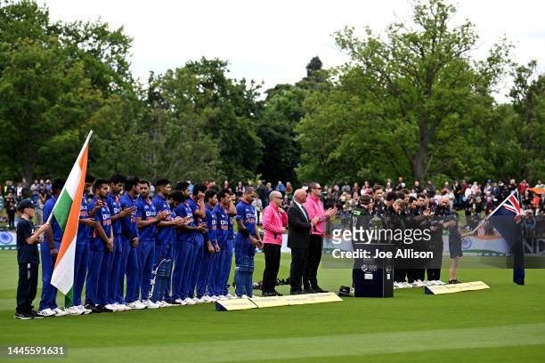 India and New Zealand stand for the national anthems during game three of the One Day International series between New Zealand and India at Hagley...
