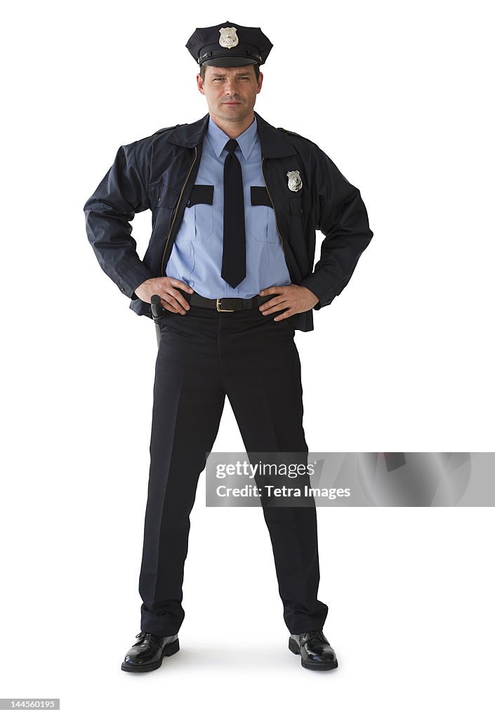 Studio portrait of police officer