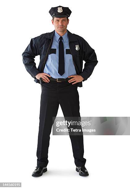 studio portrait of police officer - police uniform stockfoto's en -beelden