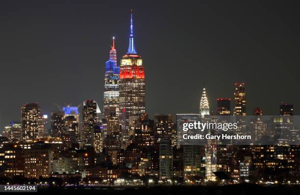 The Empire State Building and One Vanderbilt celebrate the victory by the U.S. Over Iran at the FIFA World Cup with lighting in red, white and blue...