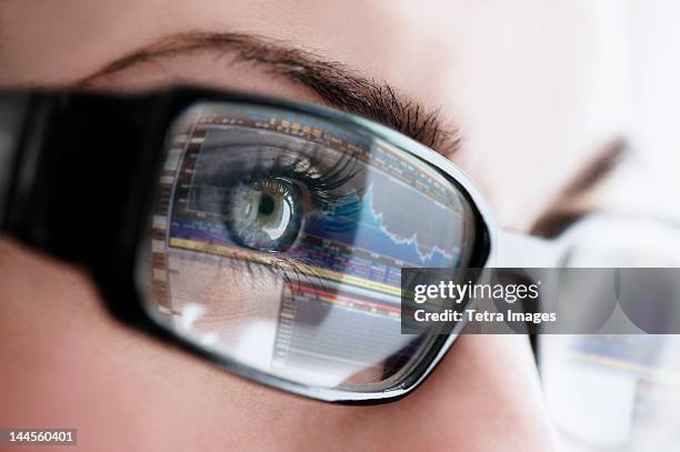 studio close-up of woman wearing eyeglasses - eye color stock pictures, royalty-free photos & images