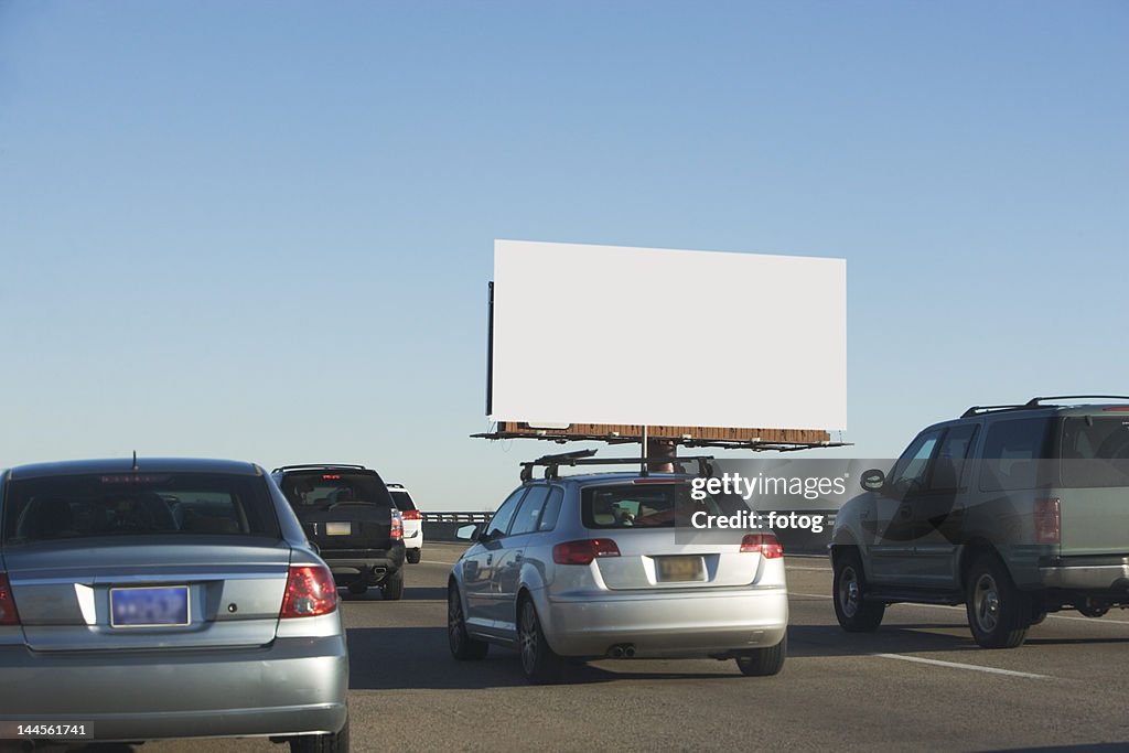 USA, Washington DC, traffic and blank billboard