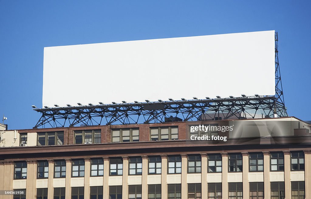 USA, New York, New York City, Blank banner on top of building