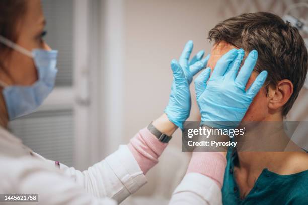 facial care - medical examination room stock pictures, royalty-free photos & images