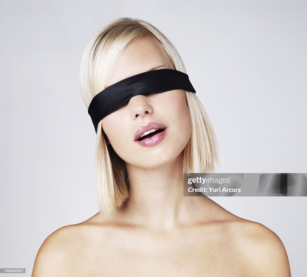 Premium AI Image  A portrait of blindfolded woman with birds