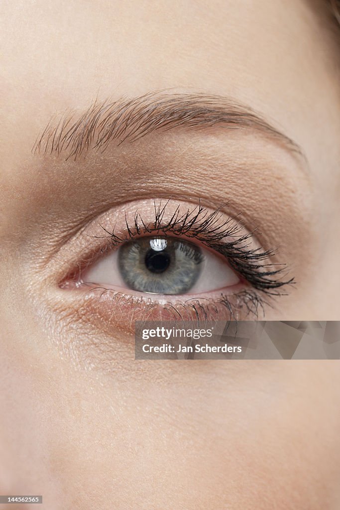 Close up of woman's eye, studio shot