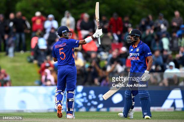 Washington Sundar of India raises his bat after scoring a half century during game three of the One Day International series between New Zealand and...