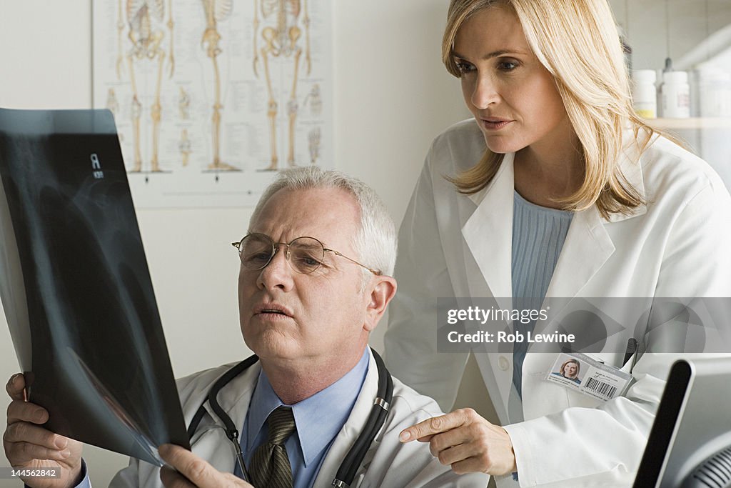 USA, California, Los Angeles, Two doctors looking at x-ray image