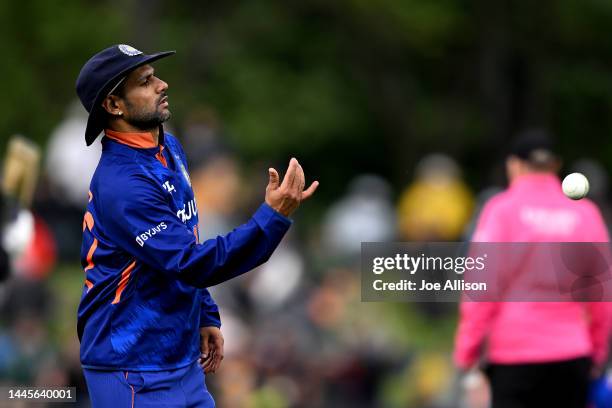 Shikhar Dhawan of India throws the ball during game three of the One Day International series between New Zealand and India at Hagley Oval on...