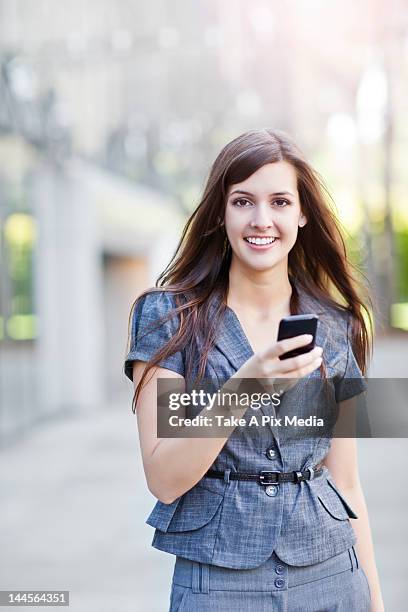 usa, seattle, young elegance standing and using mobile phone -  "suprijono suharjoto" or "take a pix media" stock pictures, royalty-free photos & images