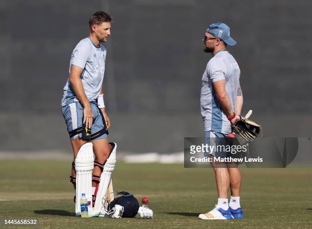 Brendon McCullum, Head Coach of England talks to Joe Root of England during a Net Session ahead of the First Test match at Rawalpindi Cricket Stadium...