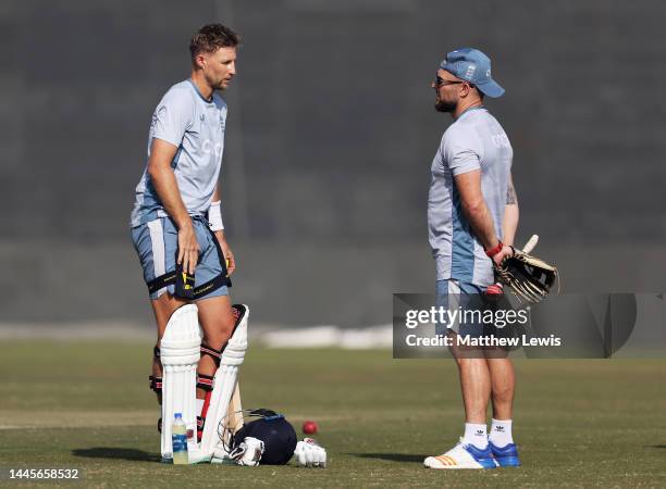 Brendon McCullum, Head Coach of England talks to Joe Root of England during a Net Session ahead of the First Test match at Rawalpindi Cricket Stadium...