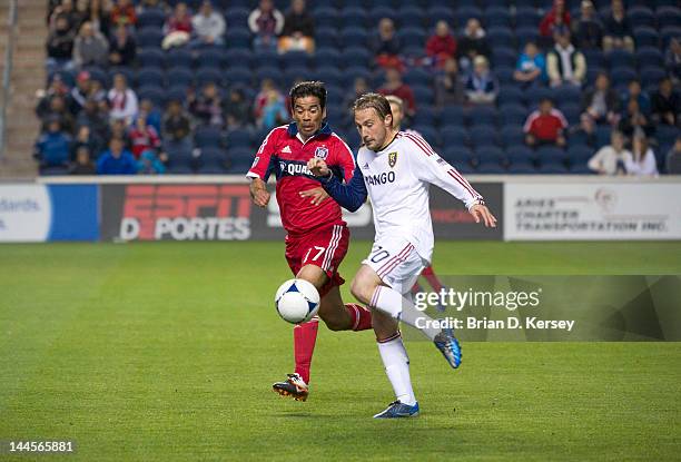 Pavel Pardo of the Chicago Fire and Ned Grabavoy of Real Salt Lake go for the ball at Toyota Park on May 9, 2012 in Bridgeview, Illinois. The Fire...