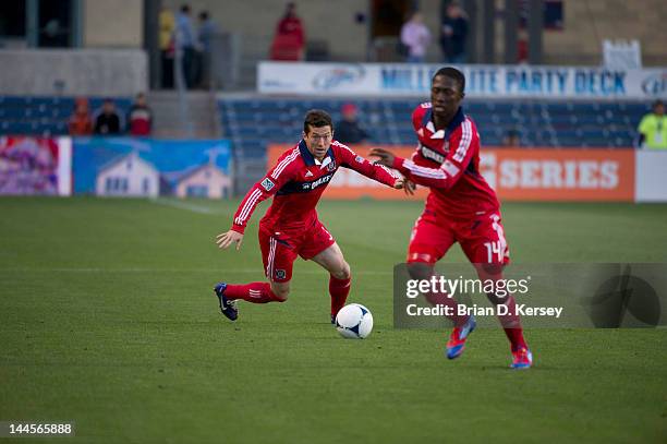 Dan Gargan of the Chicago Fire moves the ball up the field with teammate Patrick Nyarko against Real Salt Lake at Toyota Park on May 9, 2012 in...