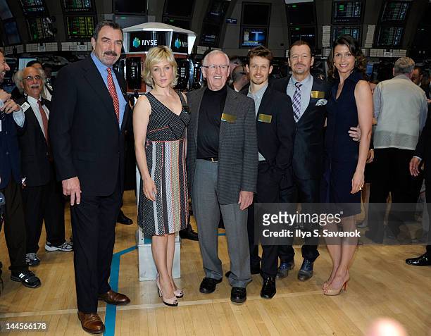 Cast of "Blue Bloods" Tom Selleck, Amy Carlson, Len Cariou, Will Estes, Donnie Wahlberg and Bridget Moynahan visit the New York Stock Exchange on May...