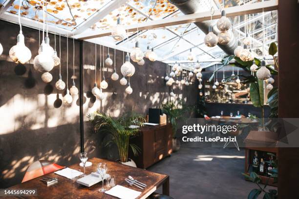 luxury restaurant interior with no people inside prior the opening service - leaf on roof stock pictures, royalty-free photos & images